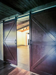 wooden doors at the entry of the yoga studio