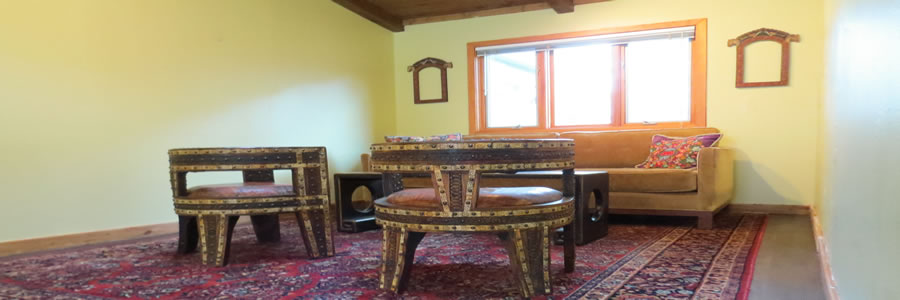 yoga lounge with a sofa and 2 chairs